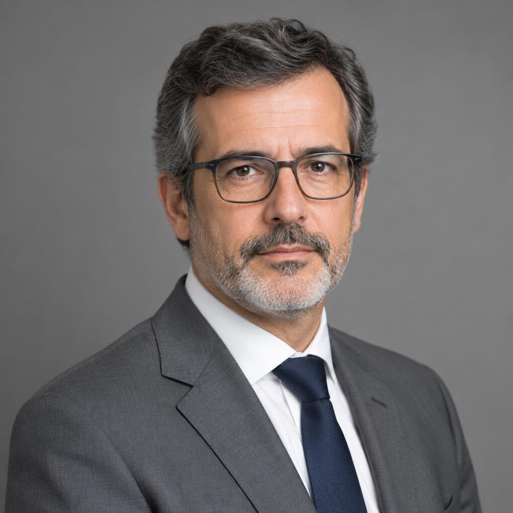 Studio portrait of a Portuguese man in his fifties, legal editor